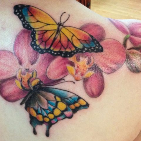 two butterflies and flower tat