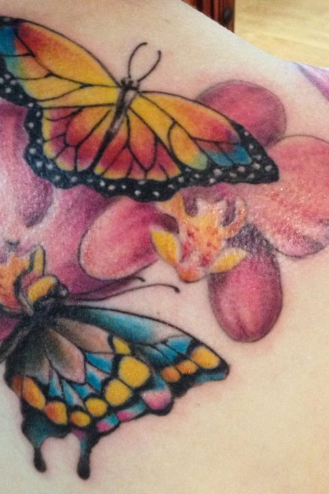 two butterflies and flower tat