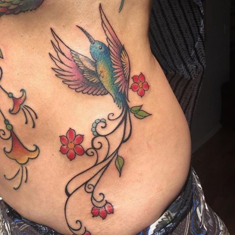 bird with cool tail tattoo