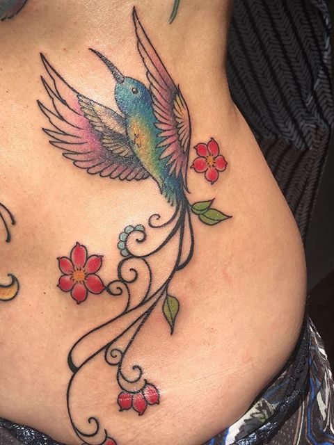 bird with cool tail tattoo