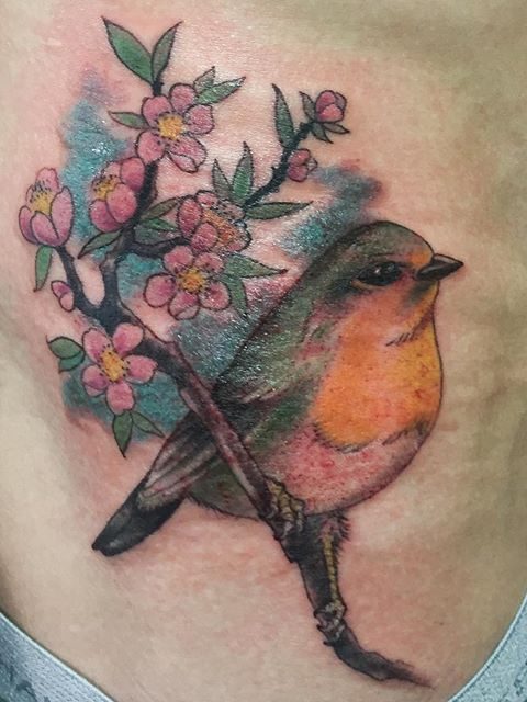 bird and flowers tattoo