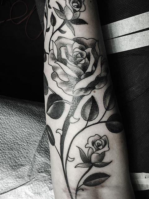 black and gray rose tattoo