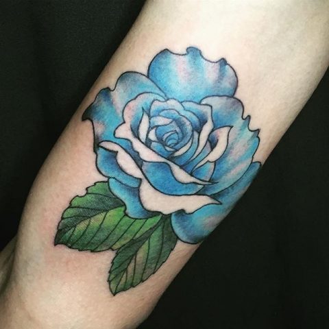 blue flower arm tattoo