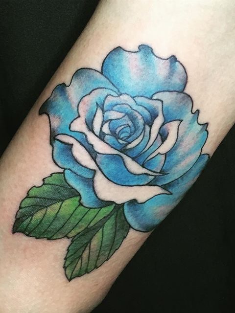 blue flower arm tattoo