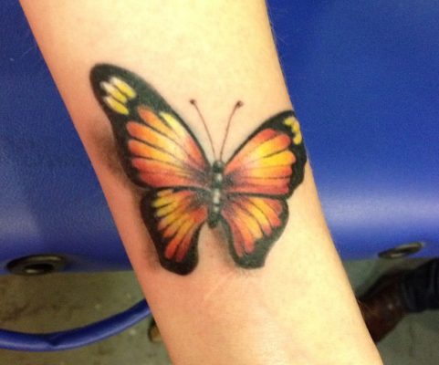 butterfly arm tattoo