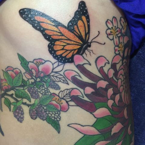 butterfly and flowers tattoo