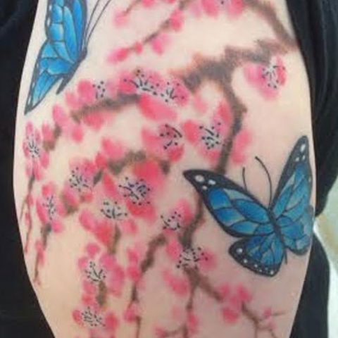 butterflies and cherry blossoms tattoo