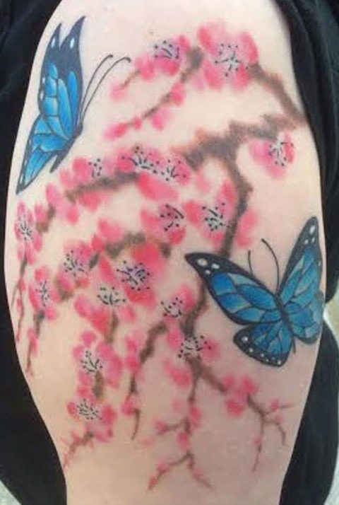 butterflies and cherry blossoms tattoo