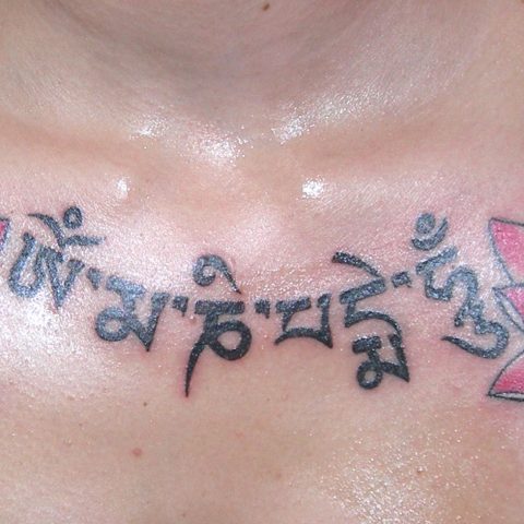 chest lotus tattoo