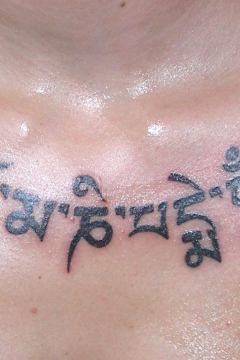 chest lotus tattoo