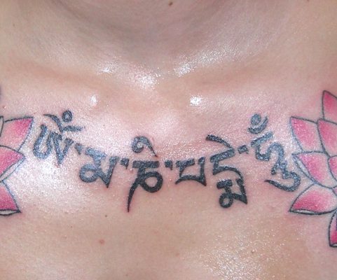 chest lotus tattoo