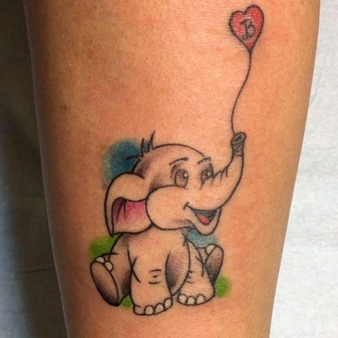 elephant with balloon tattoo