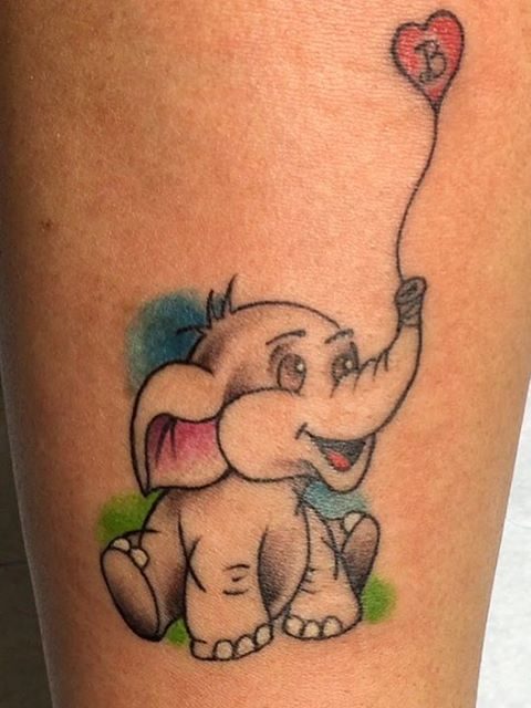 elephant with balloon tattoo