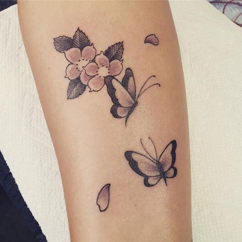 simple flowers and butterflies tattoo