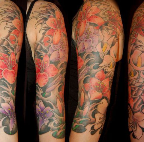 flower waves sleeve tattoo