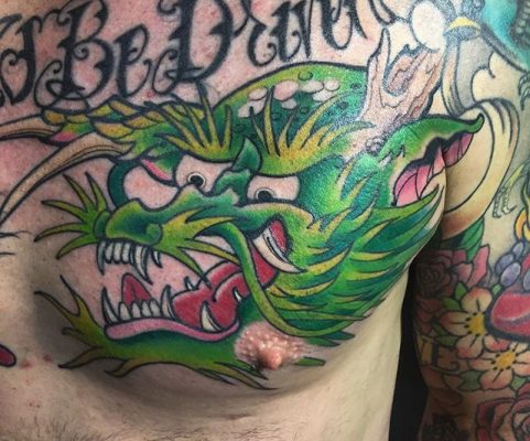 green chest dragon tattoo