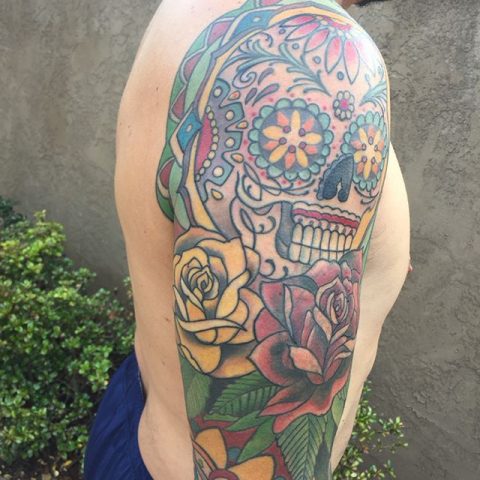 Mexican art arm tattoo