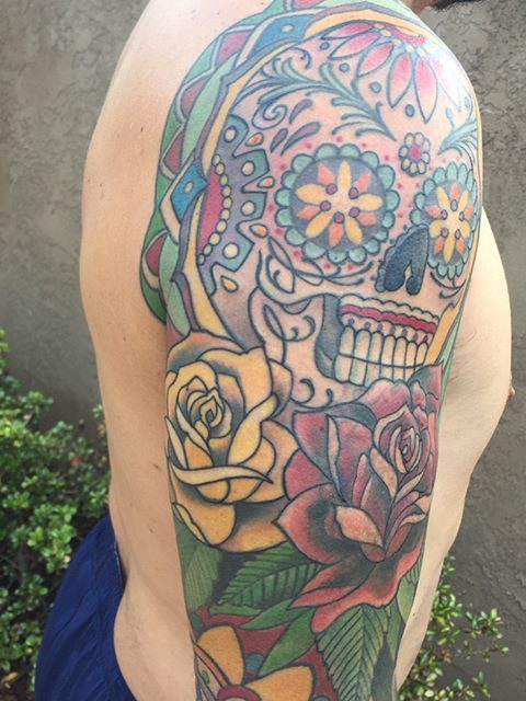 Mexican art arm tattoo