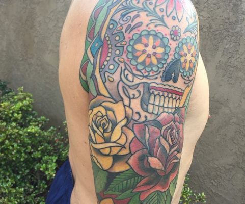 Mexican art arm tattoo