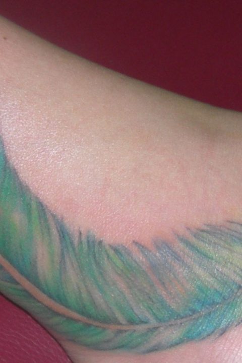 peacock feather tattoo