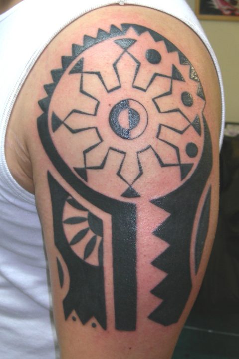 Polynesian quarter sleeve tattoo