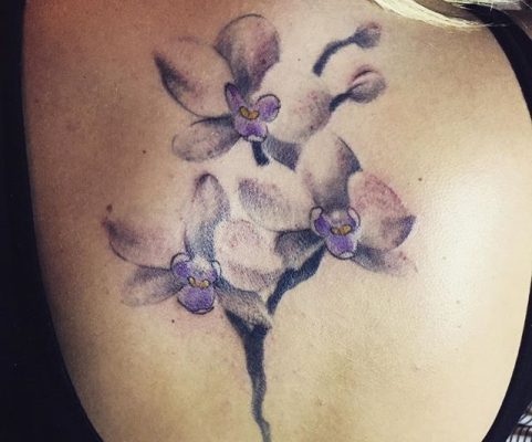 purple watercolor flowers tattoo
