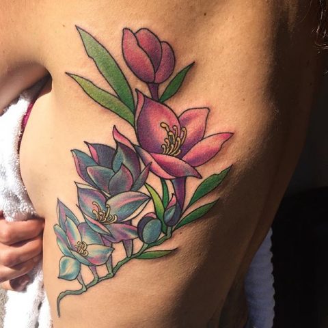 rib flowers tattoo