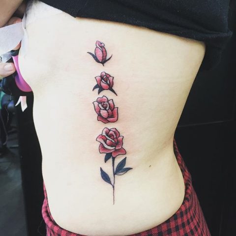 ribs roses tattoo