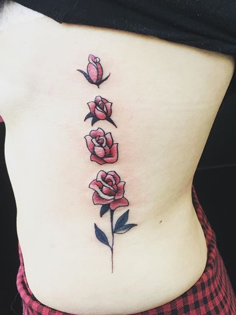 ribs roses tattoo
