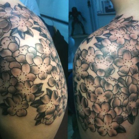 black and gray shoulder flowers