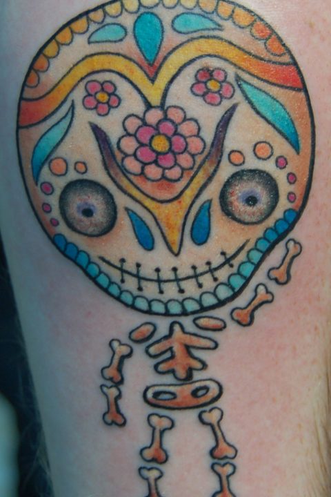 sugar skull cartoon tattoo