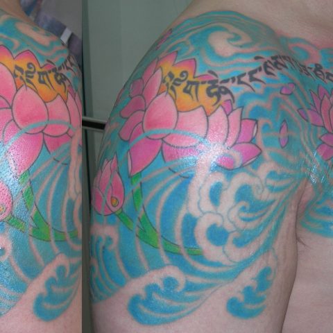 Tibetan shoulder and waves shoulder chest tattoo