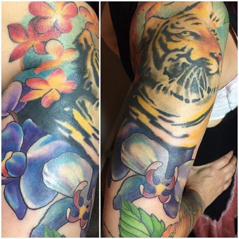 tiger and flowers sleeve tattoo