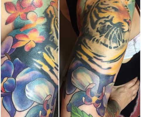 tiger and flowers sleeve tattoo