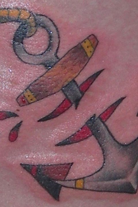 anchor cut-out tattoo