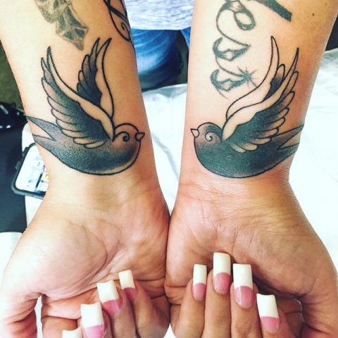 wrist birds tattoo