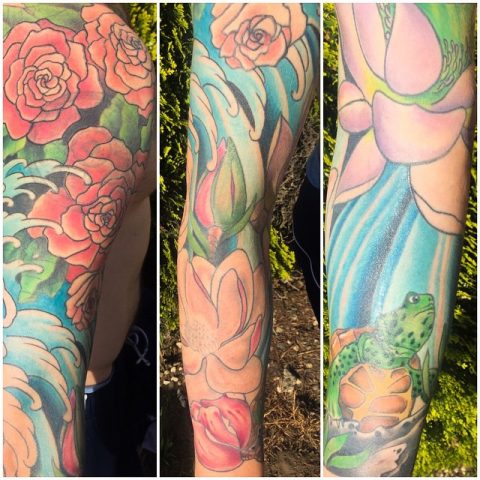 flowers waves turtle sleeve tattoo
