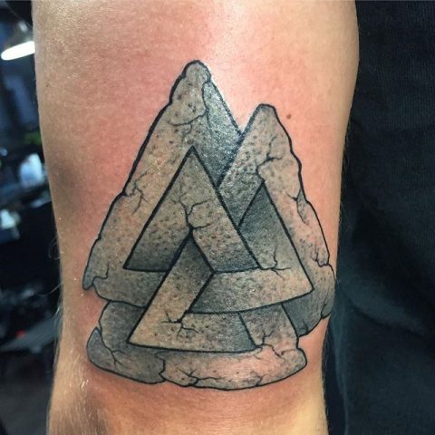 rock triangles tattoo