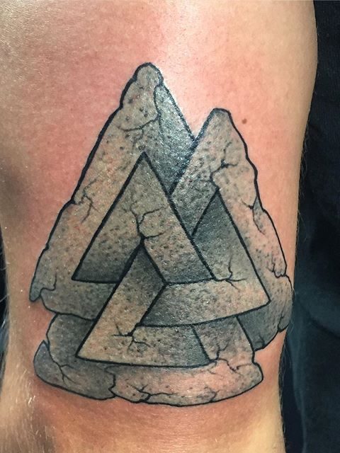 rock triangles tattoo