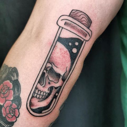 skull test tube tattoo