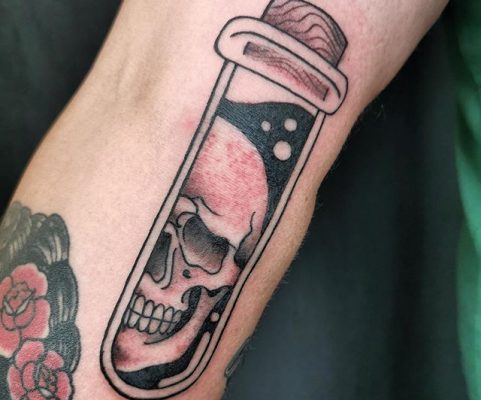 skull test tube tattoo