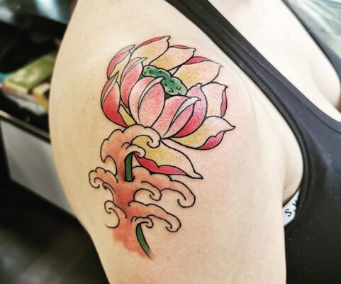 flower waves shoulder tattoo