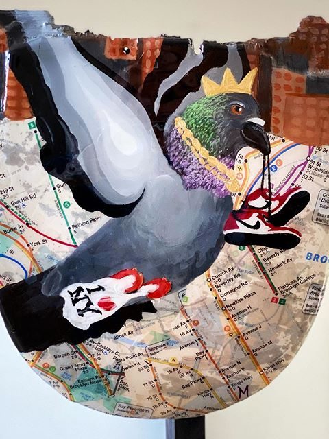 city pigeon skateboard