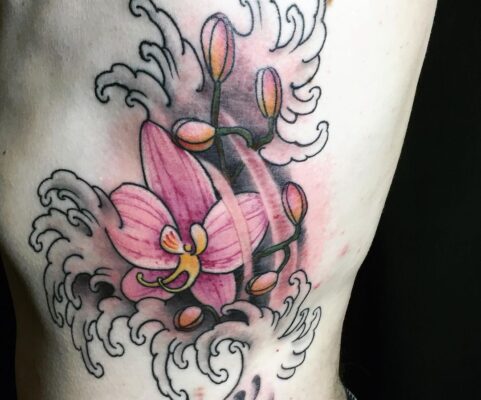 Flower Waves Rib Tattoo