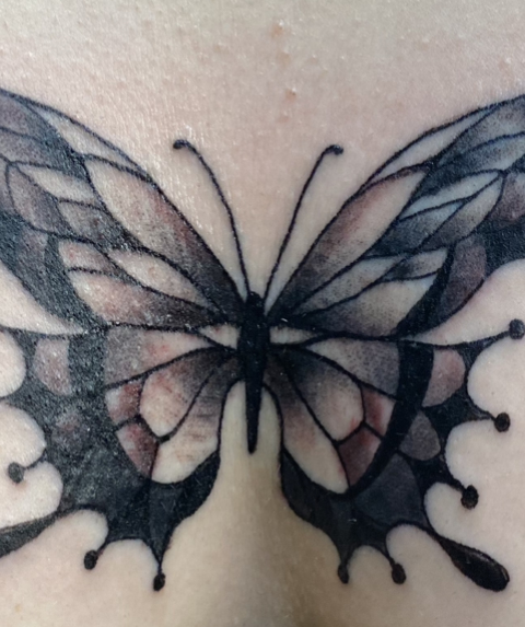 butterfly chest tattoo