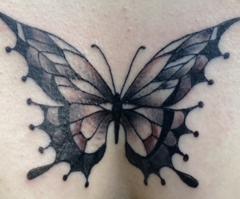 butterfly chest tattoo